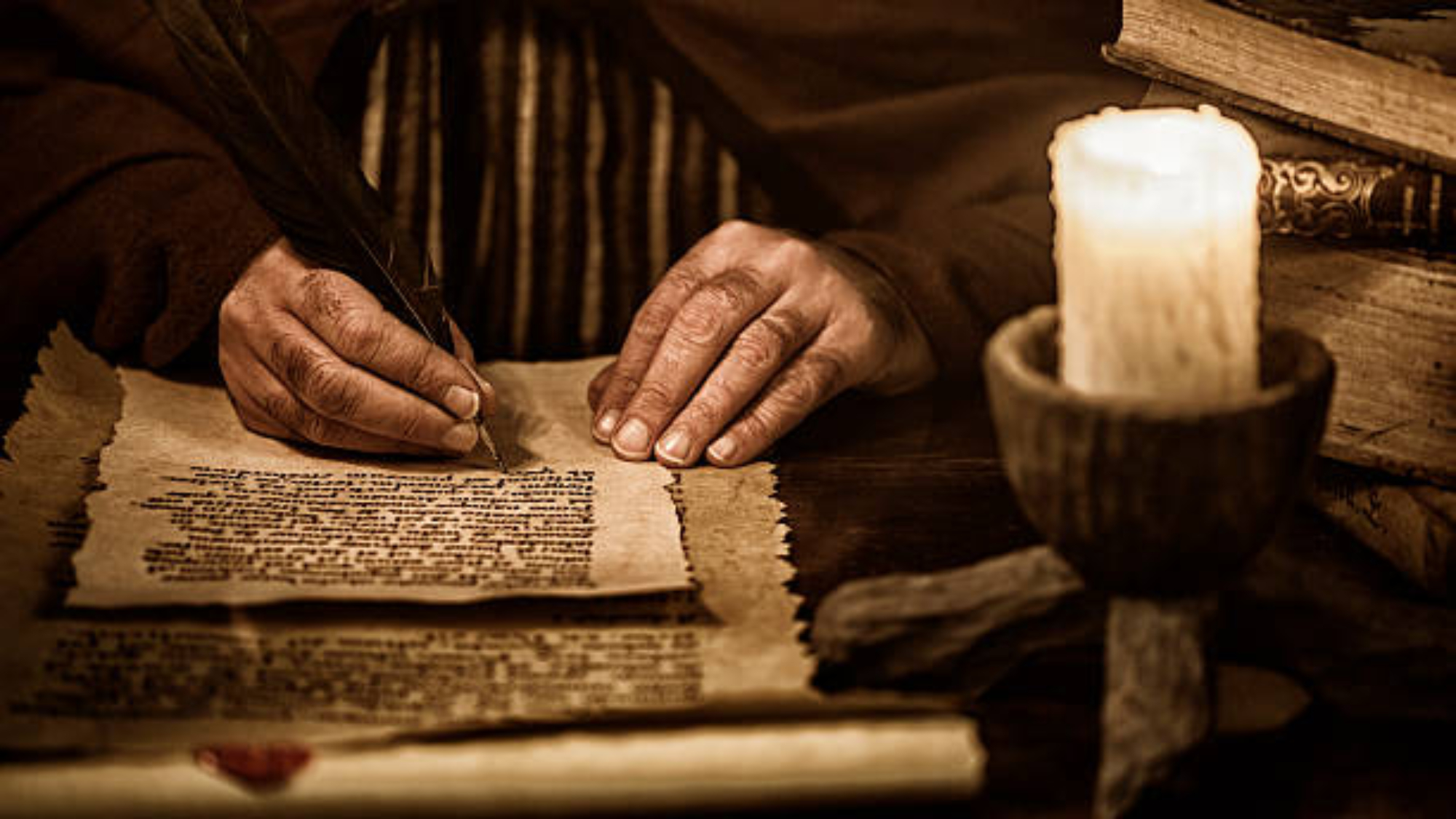 A scribe writing an old document